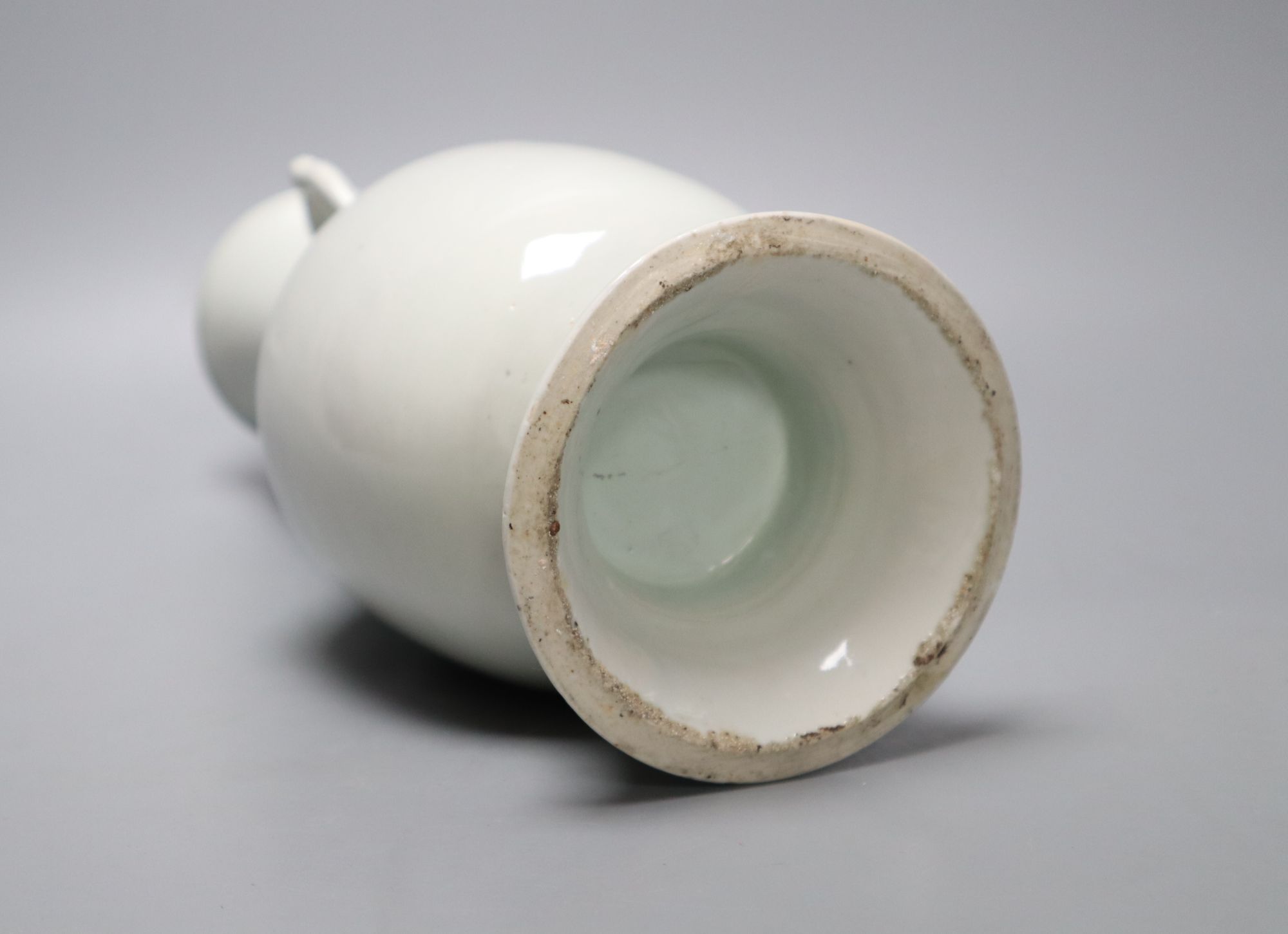 A Chinese white glazed porcelain two handled vase, height 29cm (a.f.)